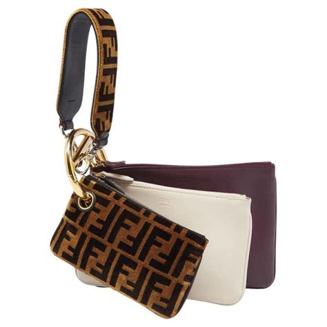 fendi triplette logo clutch bag|Fendi Triplette Clutch .